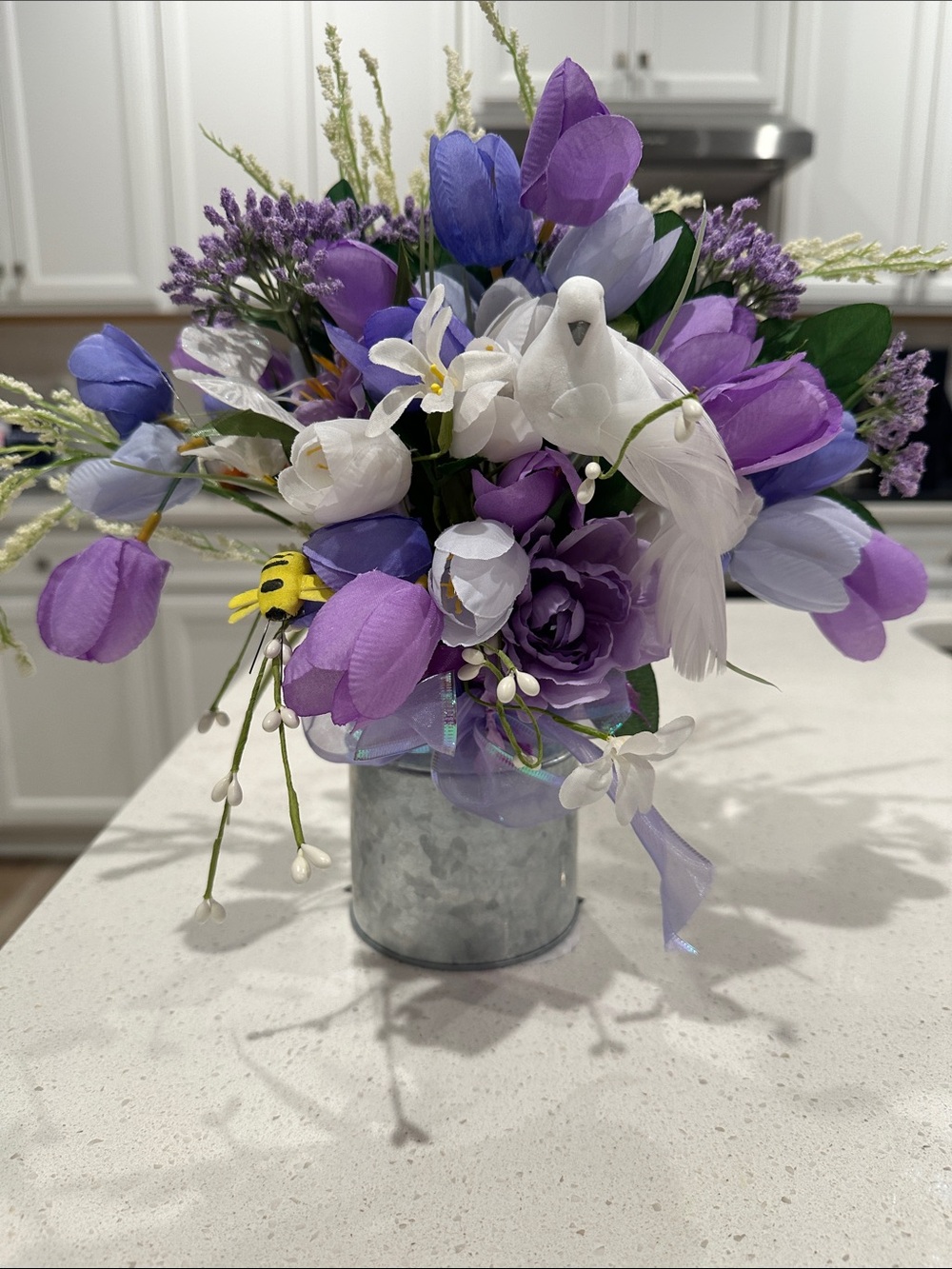 Artificial Purple and White Floral Arrangement with Decorative Bird